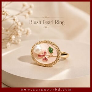 Shop the Gold & Blush Pearl Floral Ring featuring a blush pink enamel background, pearl accent, delicate floral details, and an elegant gold-tone finish.