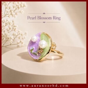 Gold & Lavender Pearl Blossom Ring Key Features Colour: Gold, Lavender Purple, Soft Green & White Main Design: Floral and botanical-inspired Enamel Colours: Lavender Purple & Soft Green Accents: Pearl-style details and floral embellishment Finish: Polished gold-tone Style: Feminine, elegant, artistic, and distinctive Ideal For: Everyday wear, dates, parties, gatherings, and special occasions Why You'll Love It This Gold & Lavender Pearl Blossom Ring is a beautiful choice for anyone who loves colourful and elegant jewellery. The combination of pastel enamel shades, pearl accents, and gold-tone detailing gives the ring a sophisticated yet playful character. Wear it alone as a statement piece or pair it with your favourite gold-tone accessories for a coordinated look. Its floral-inspired design also makes it a thoughtful gift for someone who appreciates unique and feminine jewellery.